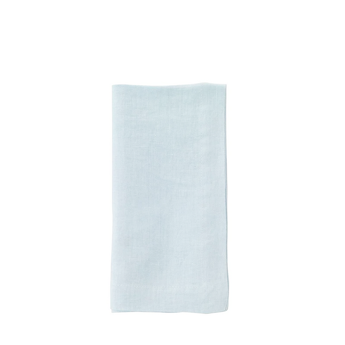 Light blue linen napkin with a smooth, soft texture folded neatly.