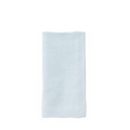 Light blue linen napkin with a smooth, soft texture folded neatly.