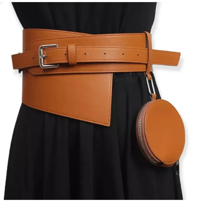 Asymmetric wide waist belt with detachable round mini bag styled over black dress