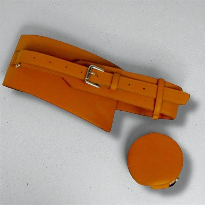 Flat lay of brown asymmetric waist belt with mini bag