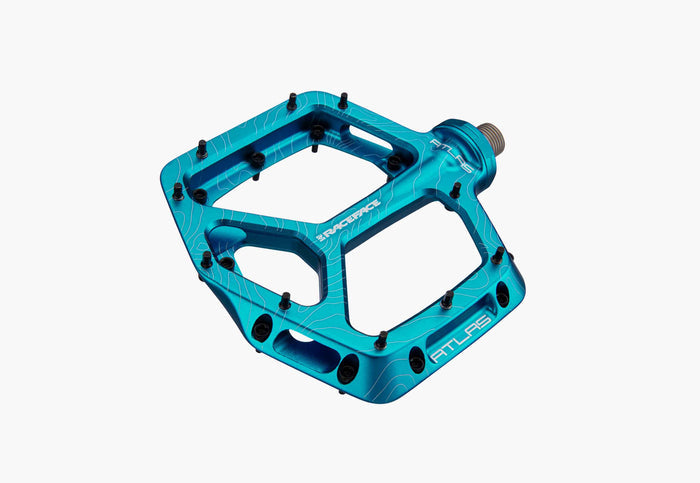 Blue bicycle pedal on a white background