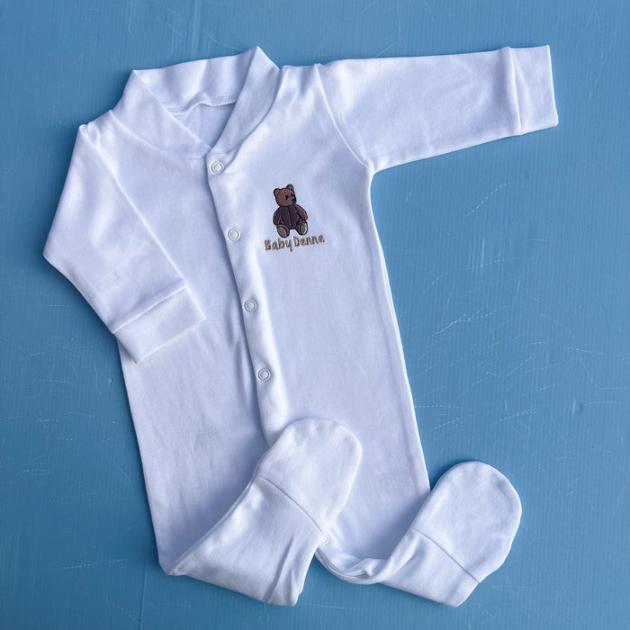 White Baby Sleepsuit with Traditional Bear with a brown bear design on a blue background
