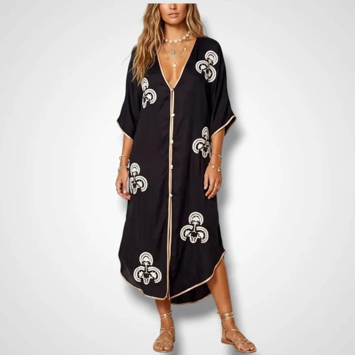 Black Button Down Embroidered Moroccan Kaftan with white embroidery, gold trim, and abalone shell buttons