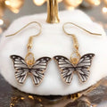 Black Charming Butterfly Dangling Earrings with gold-tone hooks and enamel wings/ women's / one size