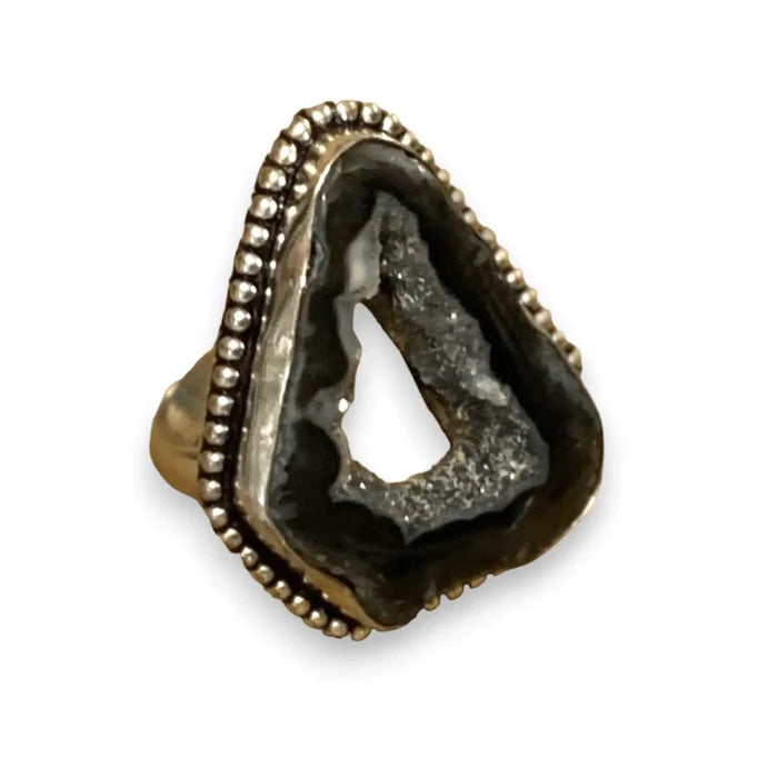 Artisan black spinel geode druzy agate statement ring on white background