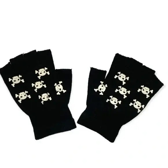 close-up skull and crossbones design on black knit fingerless gloves