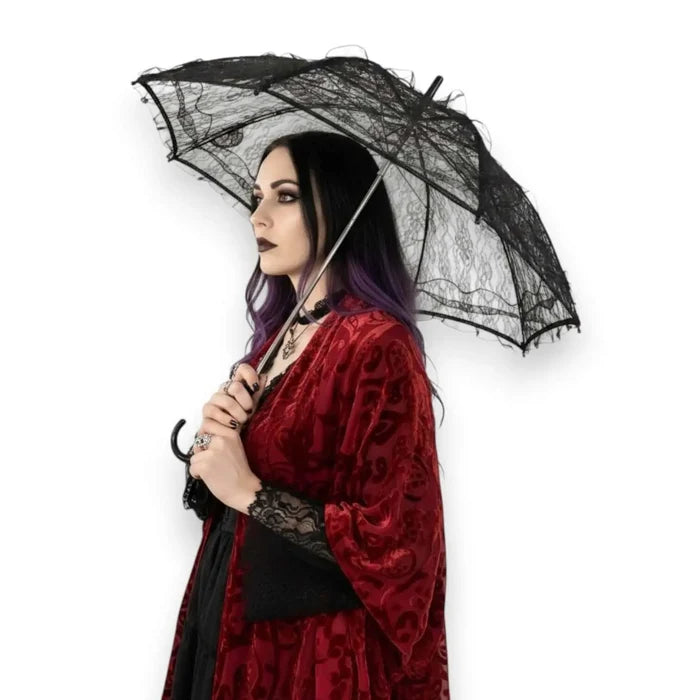 Model holding a Black Lace Vintage Parasol Umbrella with an intricate floral pattern and curved J-handle, Victorian Gothic style.