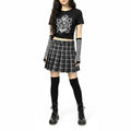 Black plaid pleated mini skirt with built-in shorts, tartan check pattern and side zipper closure