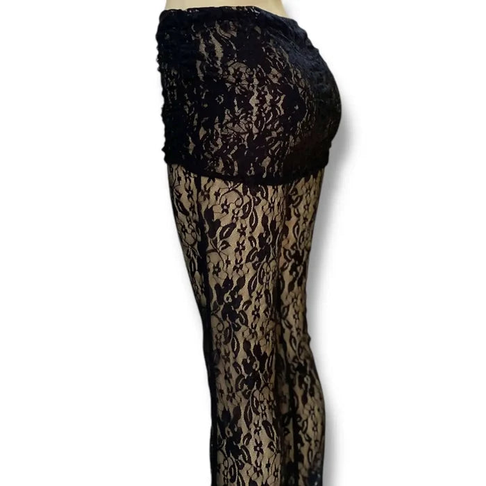 Black sheer floral lace pants with high waist and adjustable mesh panel, gothic punk flared festival style.