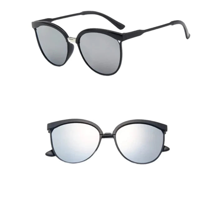 Black Silver Mirror Oversized Cat Eye Sunglasses with UV400 lenses, full rim frame, and thin temples flat lay
