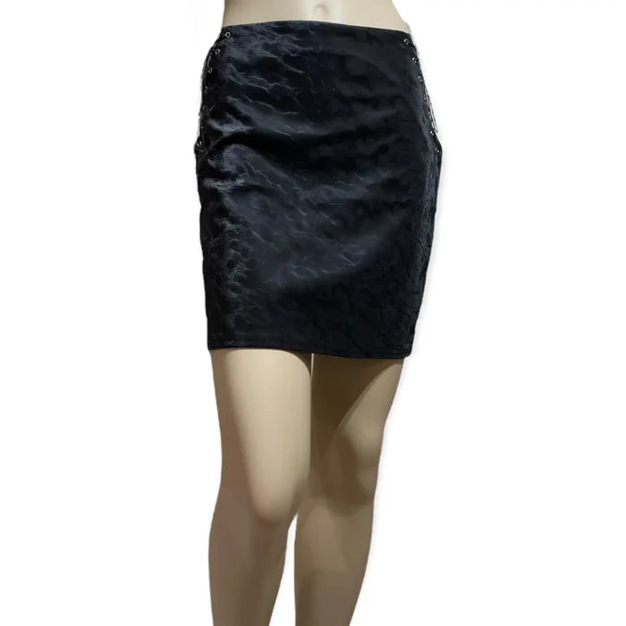 high-waisted fitted black faux suede skirt styled with heels