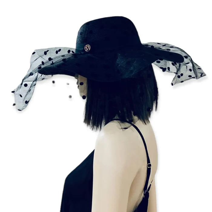 Black wide brim straw sun hat with sheer polka dot mesh overlay, gothic and punk summer fashion.