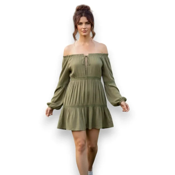 Boho Olive Green Tiered Off-Shoulder Shift Mini Dress with crochet panels, tassel tie, and long peasant sleeves model/small