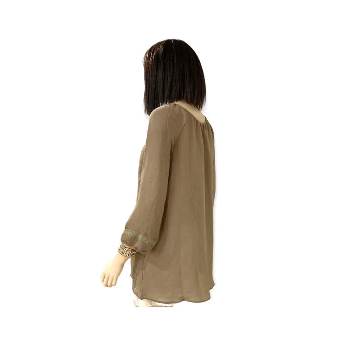 Boho olive green tunic top with embroidered panels, tassel tie keyhole, and elastic 3/4 sleeves, plus-size fit.