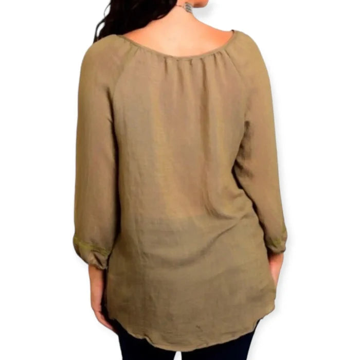 Boho olive green tunic top with embroidered panels, tassel tie keyhole, and elastic 3/4 sleeves, plus-size fit.