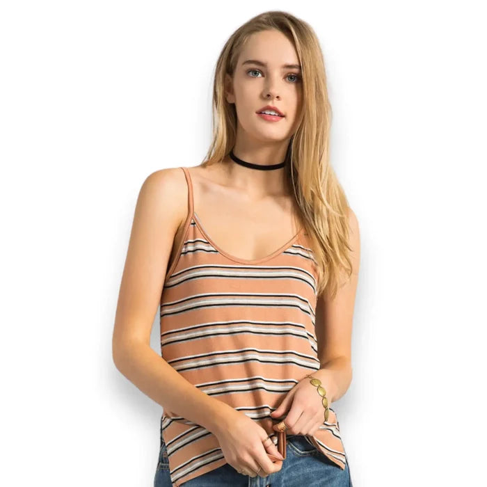 woman wearing boho striped v neck tank top in tan with gold white silver and black stripes white background