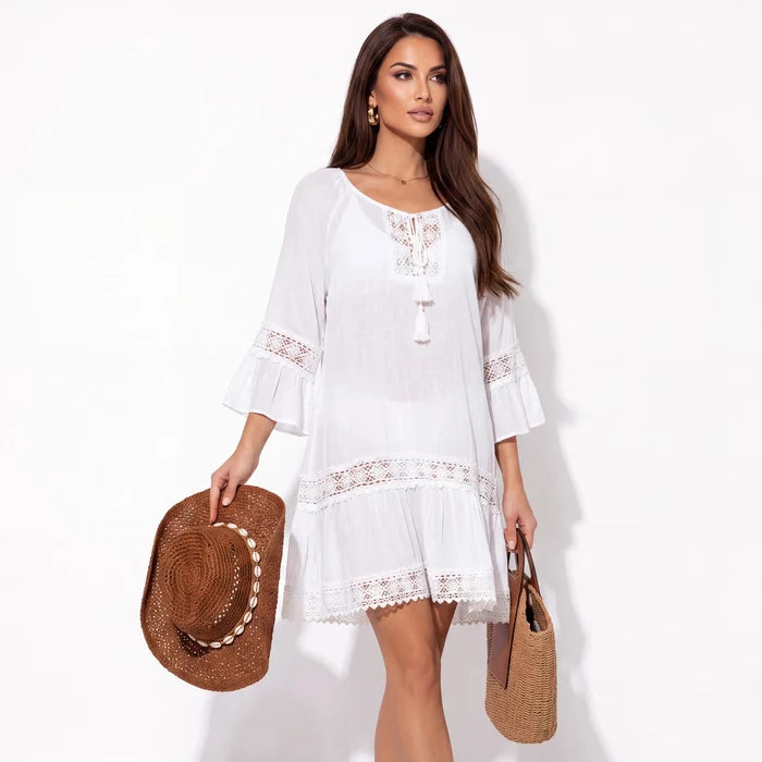 woman wearing Boho White Cotton Crochet Tunic Cover up bell sleeve tassel tie v neckline resort, beach, swimsuit cover up / s/m /