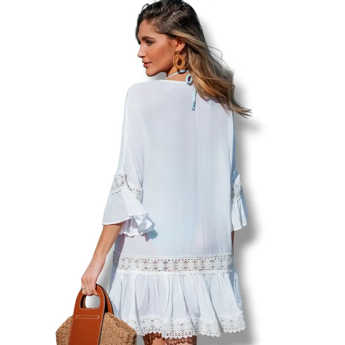 back view woman wearing Boho White Cotton Crochet Tunic Cover up bell sleeve tassel tie v neckline resort, beach, swimsuit cover up / s/m /