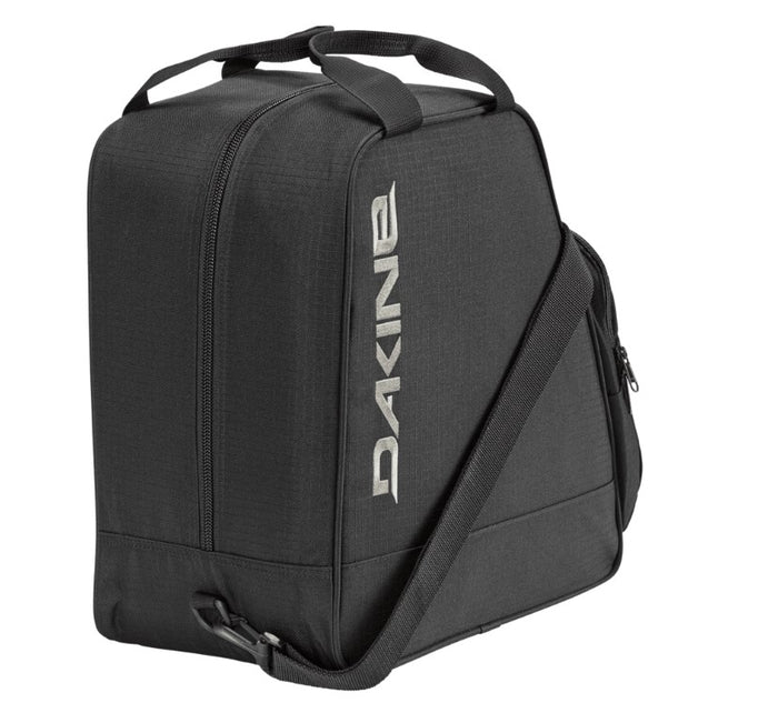 Black Dakine boot bag on a white background