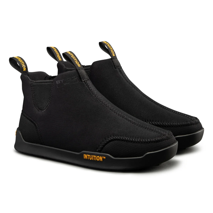 Black slip-on shoes with 'Intuition' branding on a white background