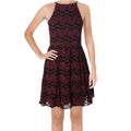 model wearing sleeveless Burgundy Lace Fit & Flare Halter Party Dress black chevron stripe accents