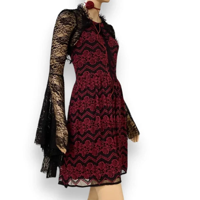 model wearing a rose choker and black cropped bolero with Burgundy Lace Fit & Flare Halter Party Dress