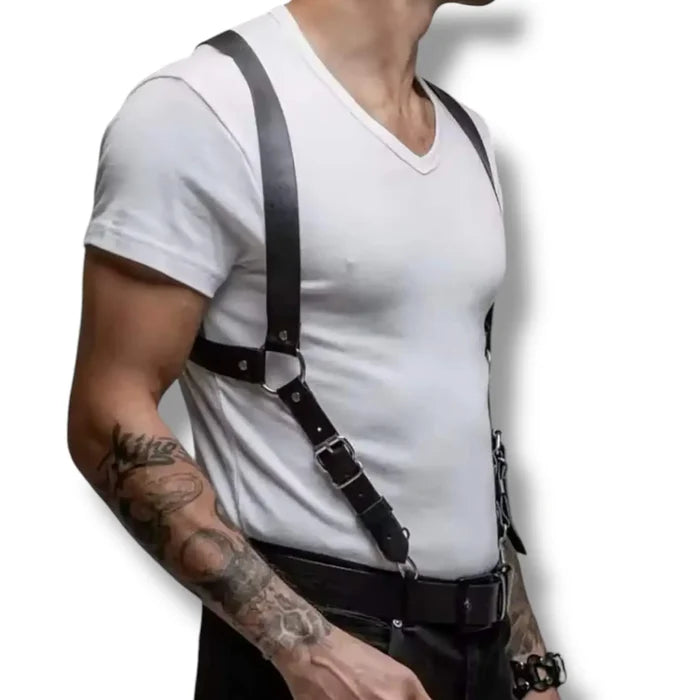 man wearing a pair of black chest harness with silver trigger clips