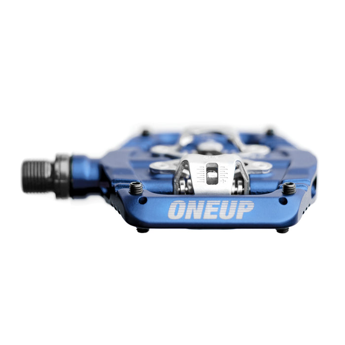 Blue cycling pedal with 'ONEUP' branding on a white background