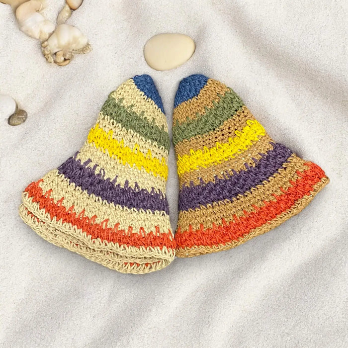 Colorful multi striped straw sun bucket hat with crochet raffia texture, adjustable brim, and Y2K summer style