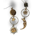 Cosmic Sun Moon Star Dangle Earrings with mixed metal silver and gold celestial charms and fish hook backs