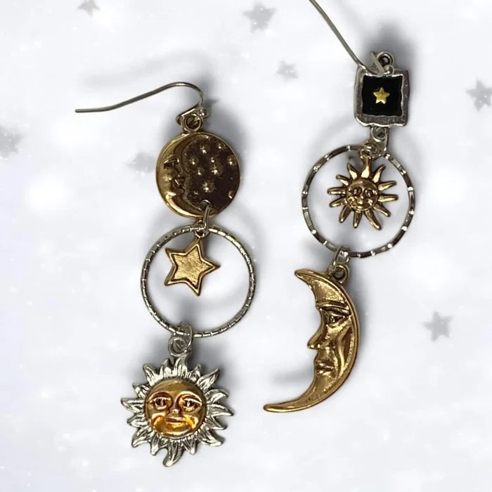 Cosmic Sun Moon Star Dangle Earrings with mixed metal silver and gold celestial charms and fish hook backs