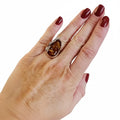 Women's Custom Sterling Silver Amber Ring with pear-shaped Baltic amber and grapevine leaf setting / 7