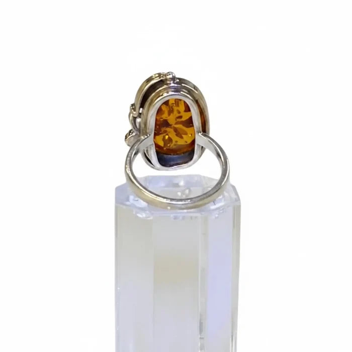 Women's Custom Sterling Silver Amber Ring with pear-shaped Baltic amber and grapevine leaf setting / 7