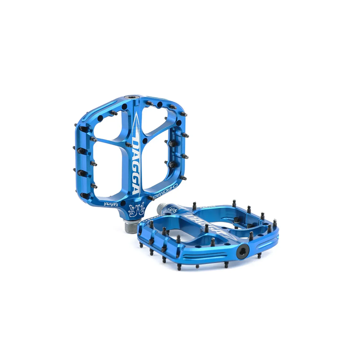 Blue bicycle pedal with 'DAGGA' branding on a white background