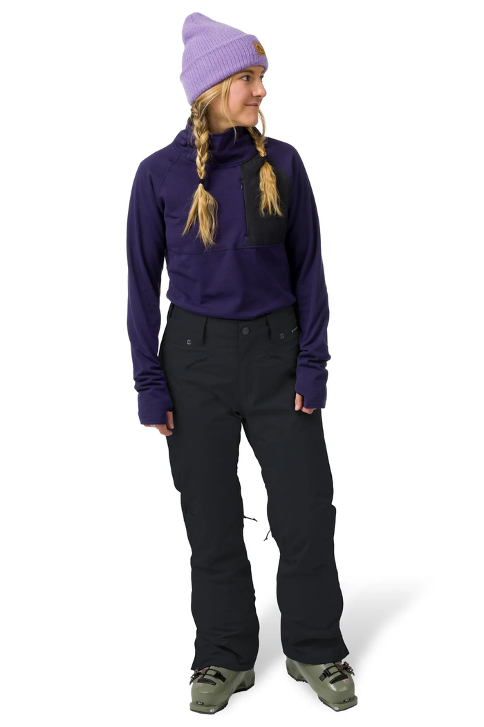 Person wearing a purple jacket, black pants, and a purple beanie on a white background