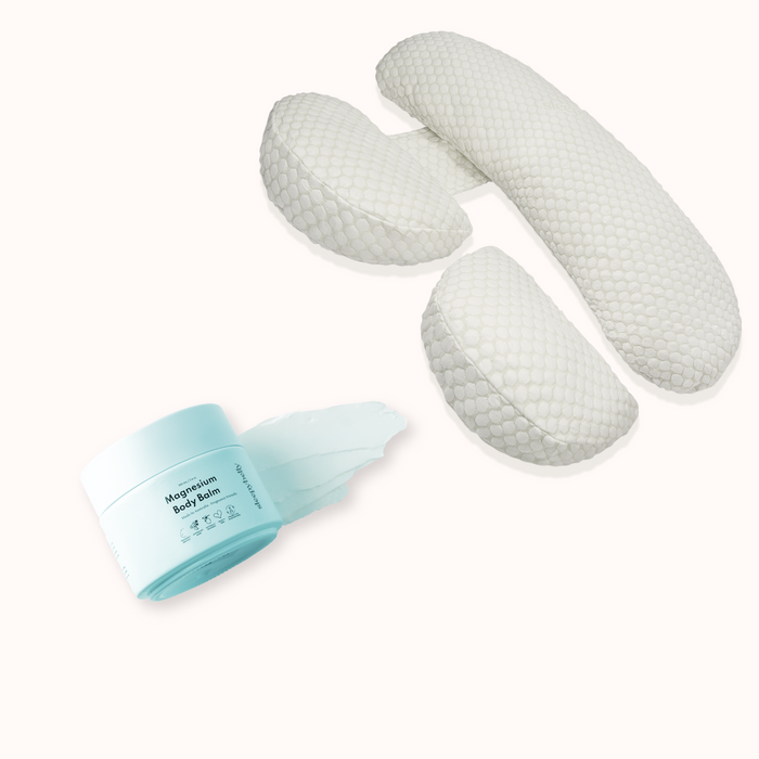 Deep Sleep Bundle showing the white adjustable pregnancy pillow set with Sleepybelly Magnesium Body Balm