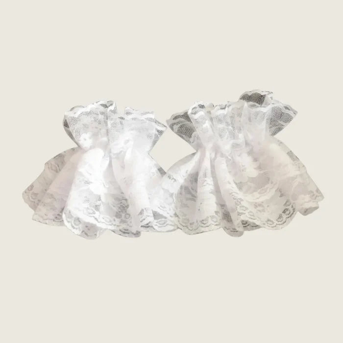 Detachable Victorian lace wrist cuffs in black or white with ruffled floral lace and stretch band