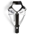 Black and white Tacx bike bottle holder on a white background