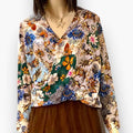 Earthy Floral V Neck Long Sleeve Blouse with envelope V neckline and lightweight textured fabric. A flattering, easy style for work or weekends medium Rachel Roy