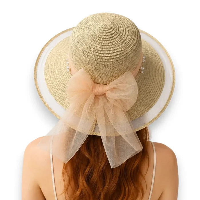 Elegant Big Bow Wide Brim Sun Hat in beige straw with peach chiffon bow, faux pearl accents, mesh brim, and chin strap