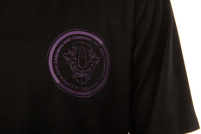 Black t-shirt with a purple logo on a white background