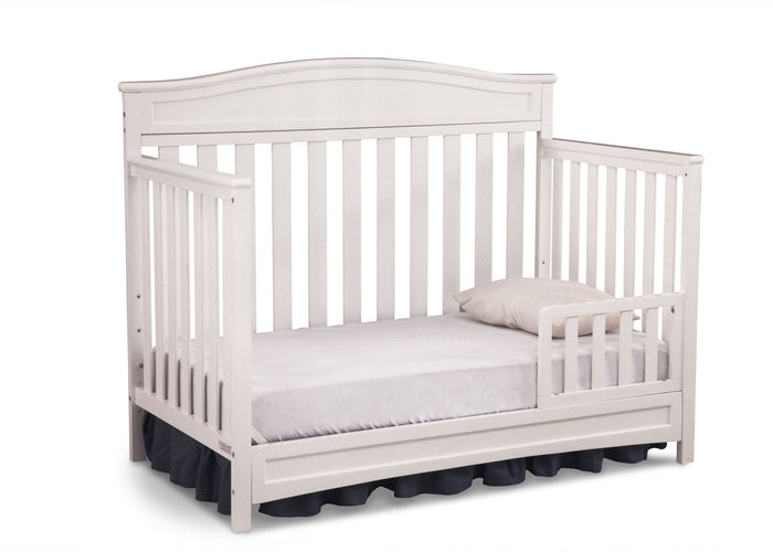 Delta Children White (100) Essington 4-in-1 Crib angled conversion to toddler bed a4a