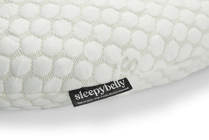 Soft grey Sleepybelly extra pillowcase in breathable quilted fabric with brand tag detail