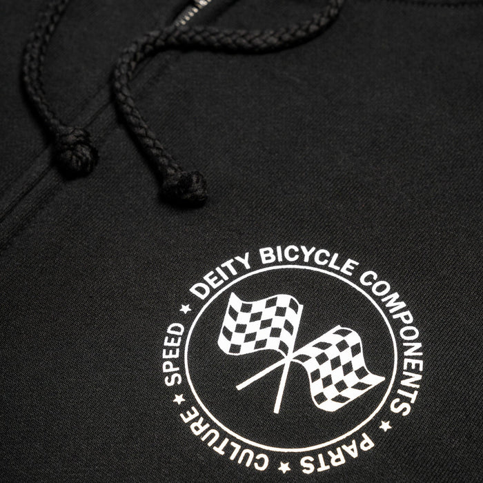 Close-up of a black hoodie with a white circular chest graphic featuring two checkered flags and the text 'DEITY BICYCLE COMPONENTS' and 'SPEED CULTURE PARTS'.