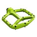 Green bicycle pedal on a white background
