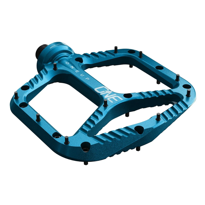 Blue bicycle pedal with 'ONEUP' branding on a white background