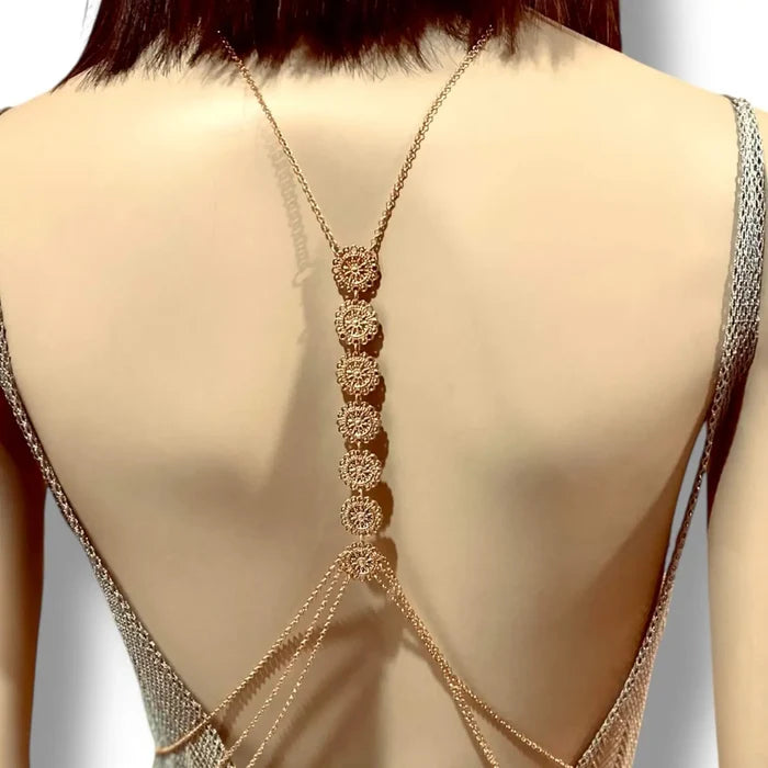 Floral metal chest chain body jewelry with round medallion links and triple draped waist chains in gold and silver—perfect for rave, beach, or festival fashion.