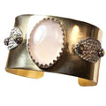 Gilded Rose Quartz & Sterling Leaf Cuff with oval rose quartz, brass wide band, and riveted silver leaves