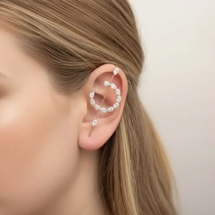 woman wearing Gold Cosmic Helix Hook Pin Earring with crystal crescent, ear wrap hook, and long pin for pierced ears