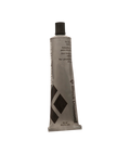 Tube of ski skin adhesive on a white background